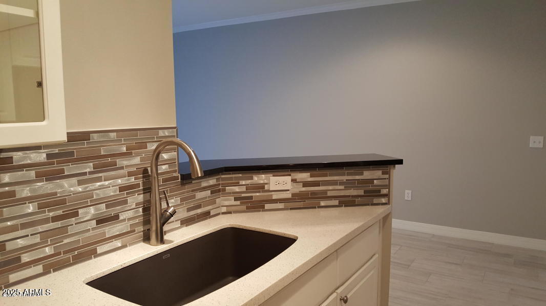 1701 East Colter Street, Unit 153 Phoenix, AZ 85016 - Photo 3 of 11 a close view of sink and tap
