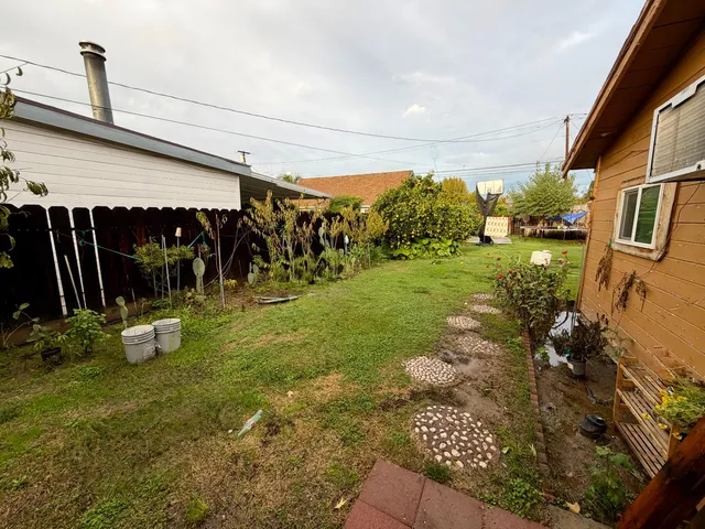 a view of a garage with a patio