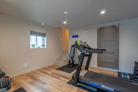 a view of a room with gym equipment