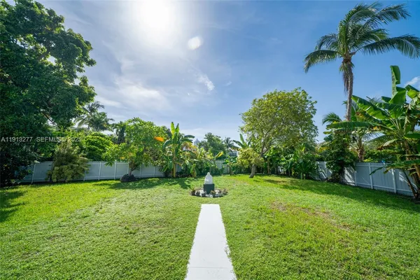 a view of a garden with a fountain