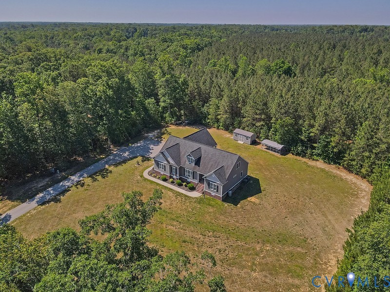 9425 Marie Road New Kent, VA 23124 - Photo 19 of 55 a view of a backyard with mountain view