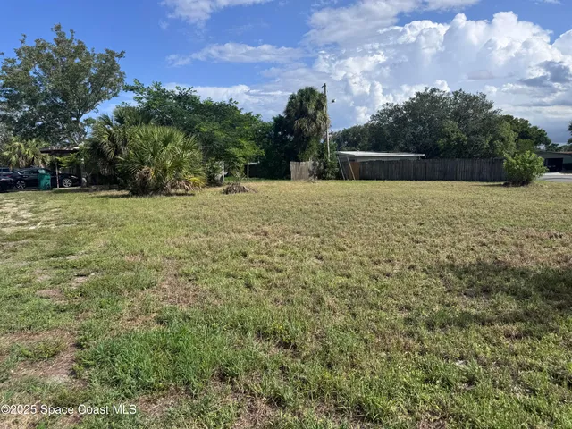 a view of outdoor space and yard