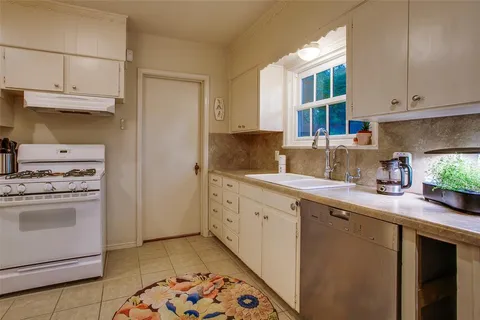 a view of a backyard with a garden