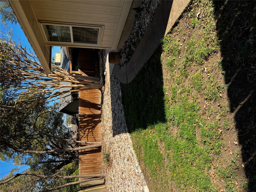 13169 Mill Stone Drive Austin, TX 78717 - Photo 7 of 8 a view of a backyard of the house