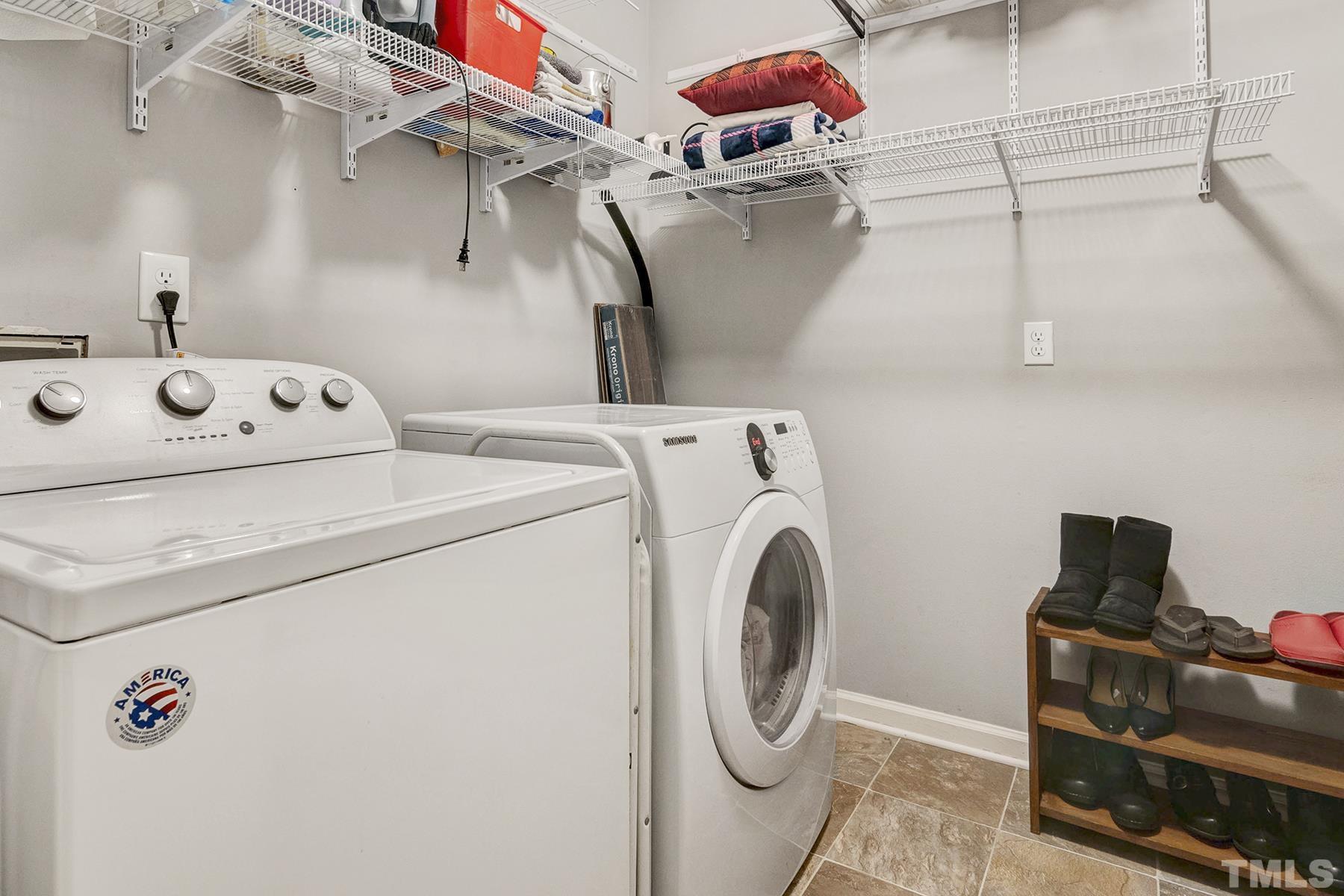 27 Sunflower Court Durham, NC 27713 - Photo 17 of 18 a utility room with dryer and washer