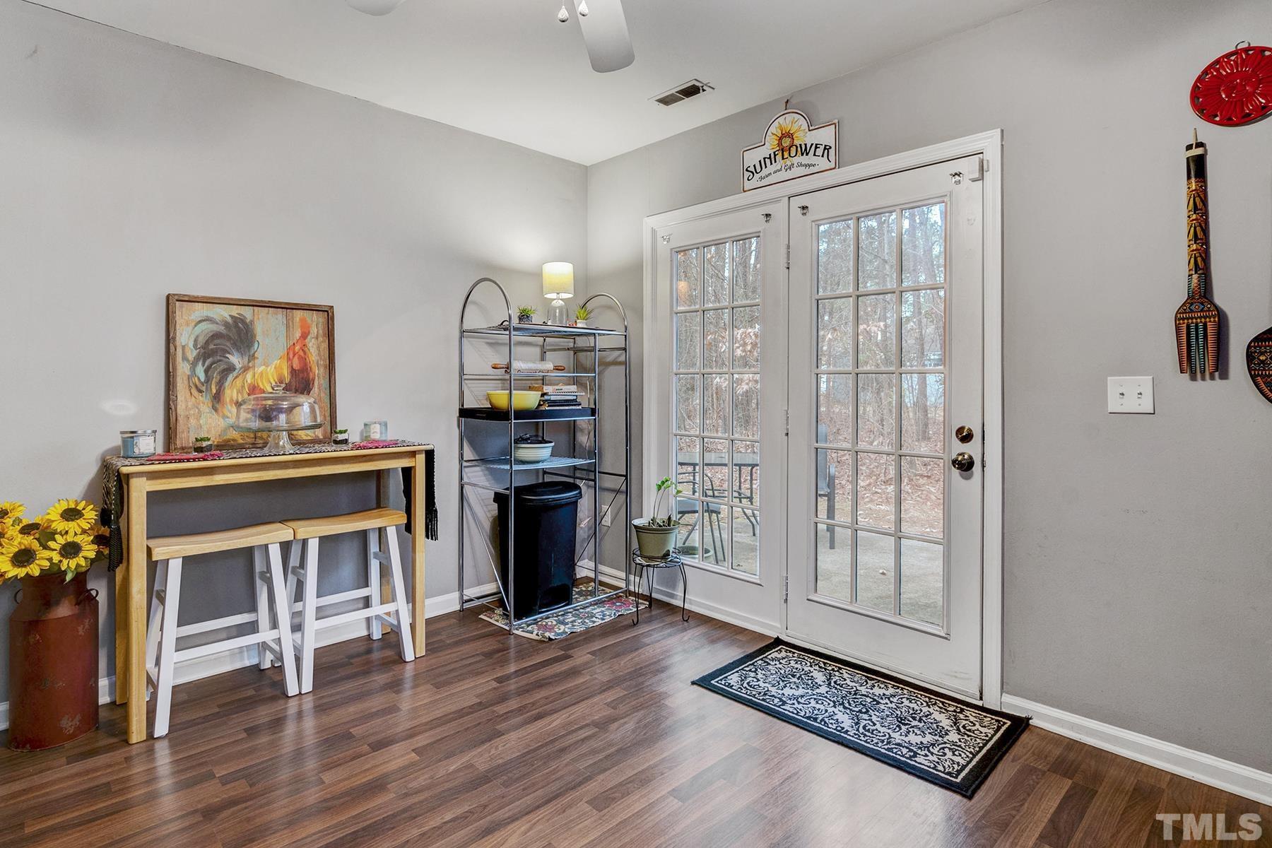 27 Sunflower Court Durham, NC 27713 - Photo 10 of 18 a view of livingroom with furniture and wooden floor