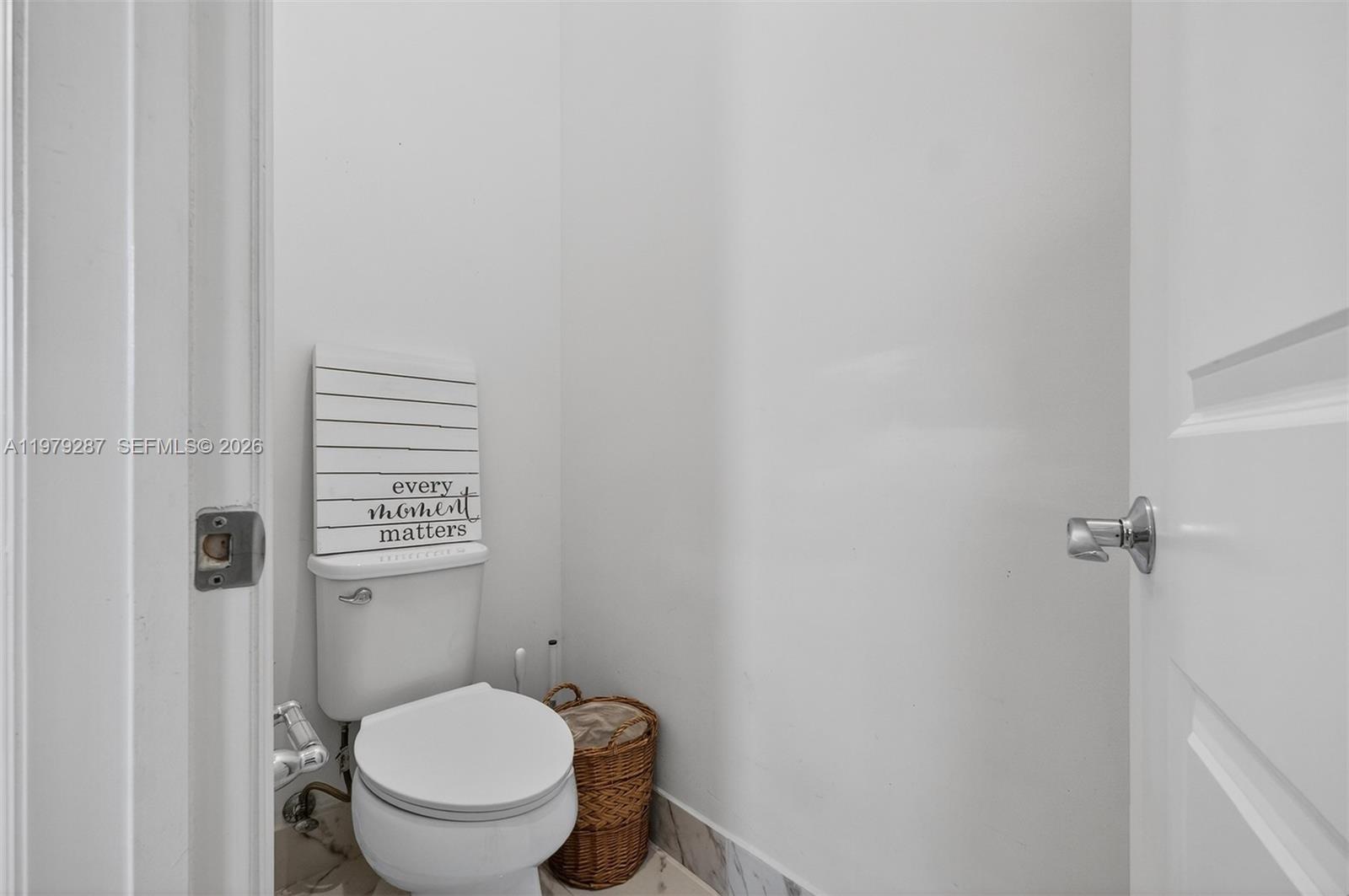 14929 Southwest 176th Terrace Miami, FL 33187 - Photo 18 of 40 a white toilet sitting next to a shower