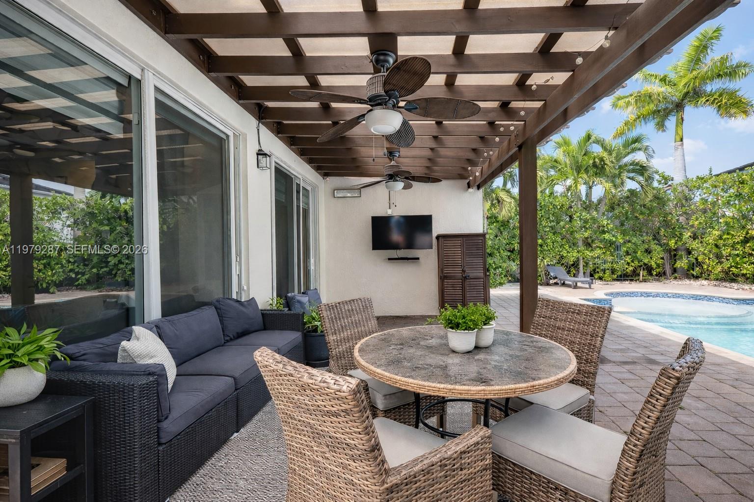 14929 Southwest 176th Terrace Miami, FL 33187 - Photo 29 of 40 a outdoor space with furniture