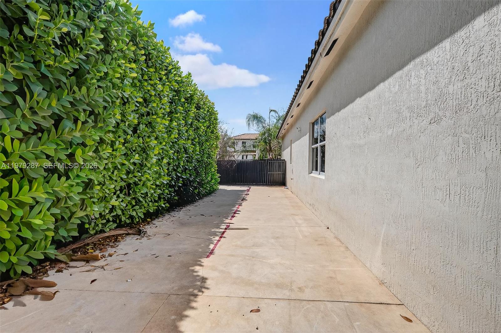 14929 Southwest 176th Terrace Miami, FL 33187 - Photo 30 of 40 a view of a backyard