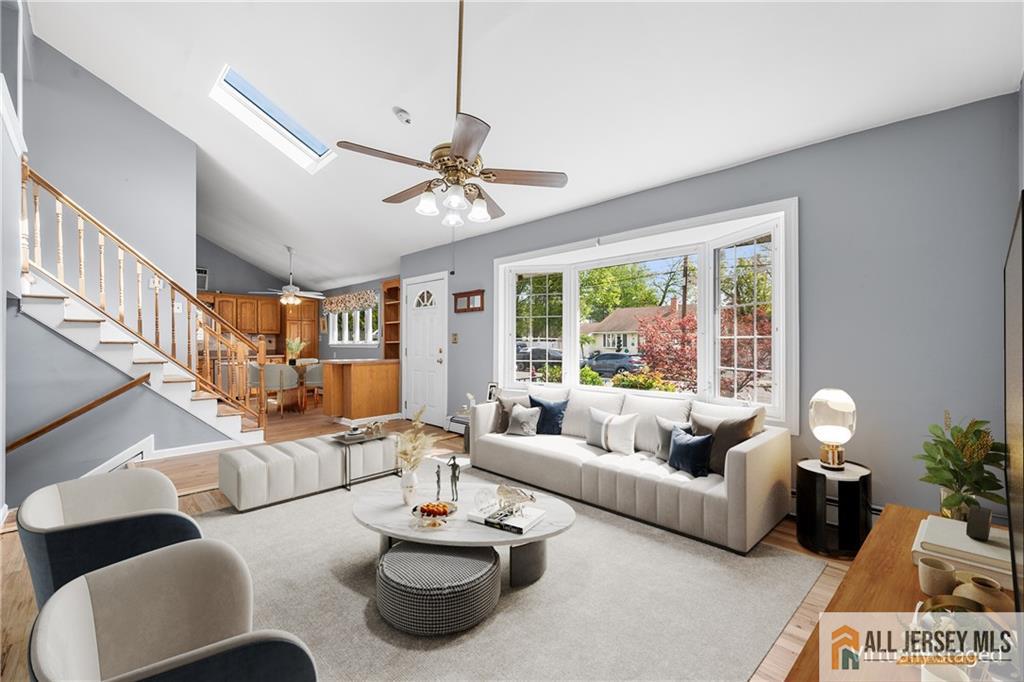 67 Drake Place Colonia, NJ 07067 - Photo 3 of 31 a living room with furniture and a large window