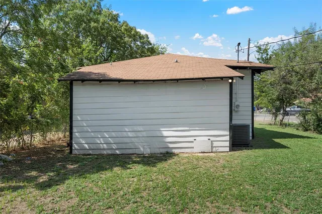 a backyard of a house with lots of green space