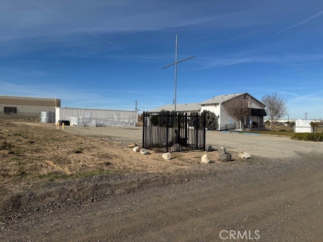42901 6th Street East Lancaster, CA 93535 - Photo 4 of 12 a view of a house with a street