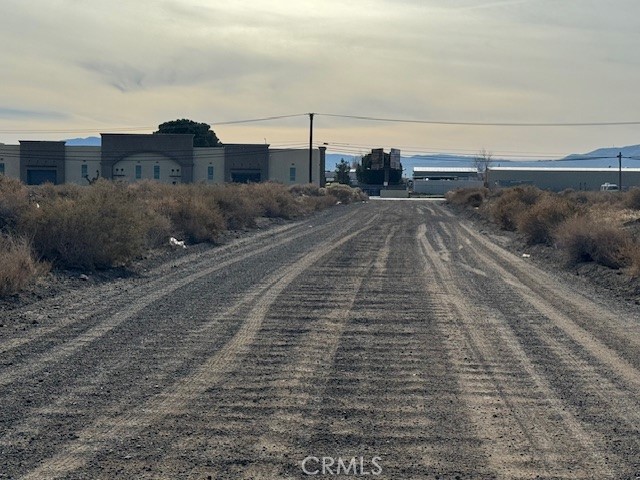 42901 6th Street East Lancaster, CA 93535 - Photo 7 of 12 a view of a dry yard with wooden fence