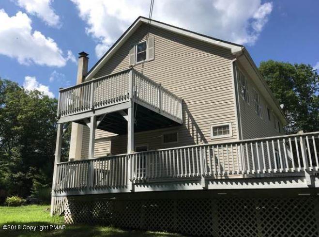 1090 Milford Road Dingmans Ferry, PA 18328 - Photo 3 of 13 a view of a house with a deck