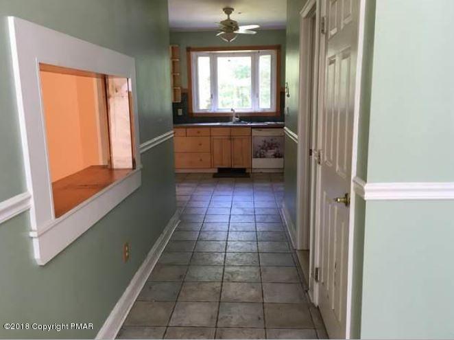 1090 Milford Road Dingmans Ferry, PA 18328 - Photo 6 of 13 a bathroom with a bathtub and a shower