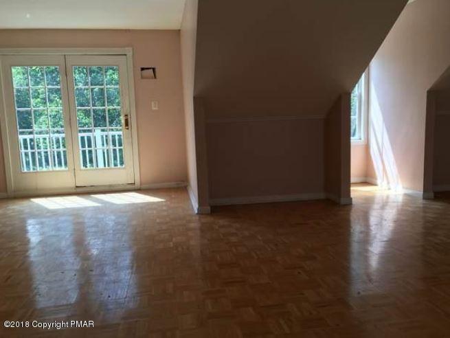 1090 Milford Road Dingmans Ferry, PA 18328 - Photo 8 of 13 a view of an empty room with a window