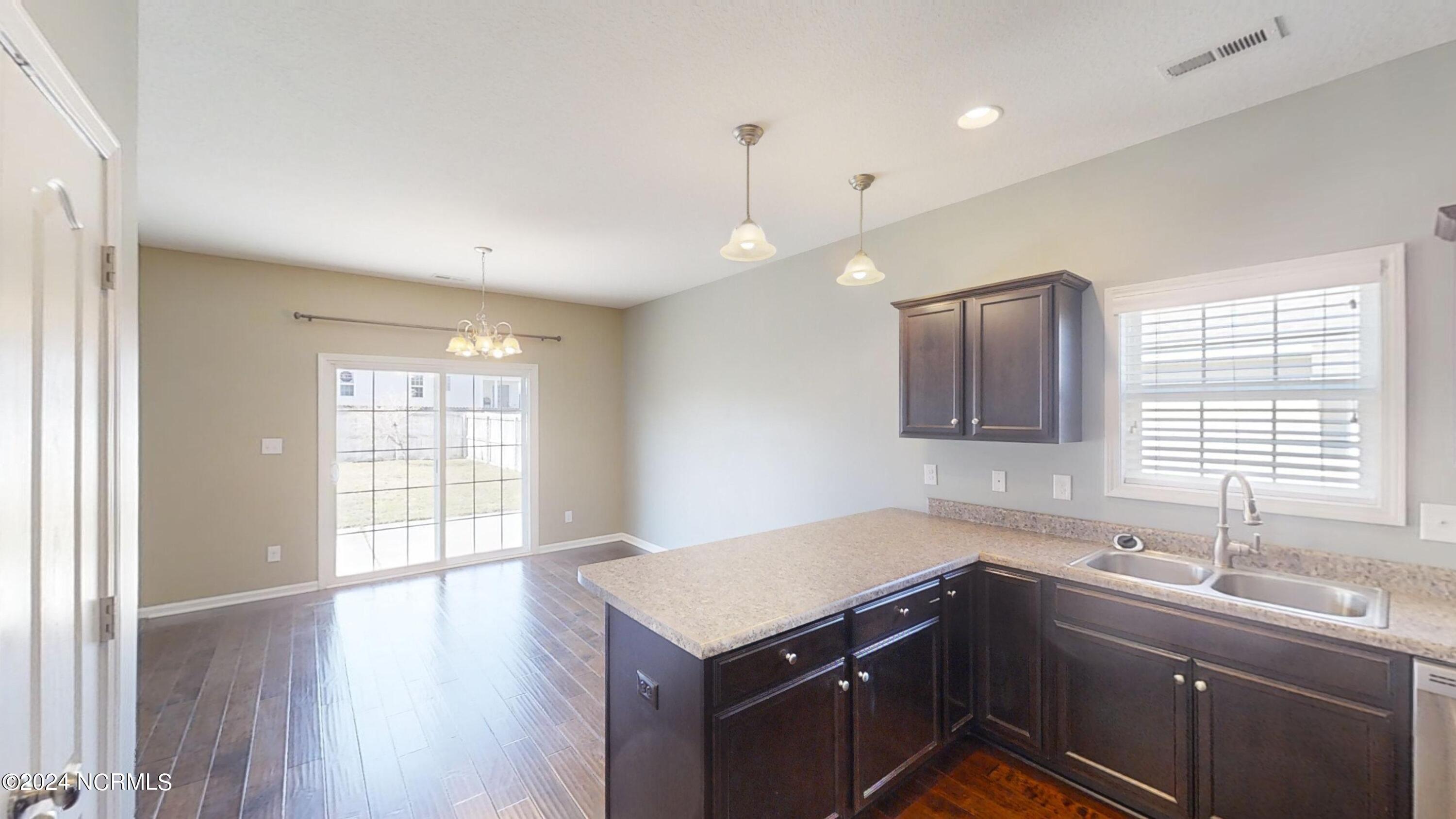 512 Romper Road Sneads Ferry, NC 28460 - Photo 21 of 32 512-Romper-Road-Dining-AreaKitchen