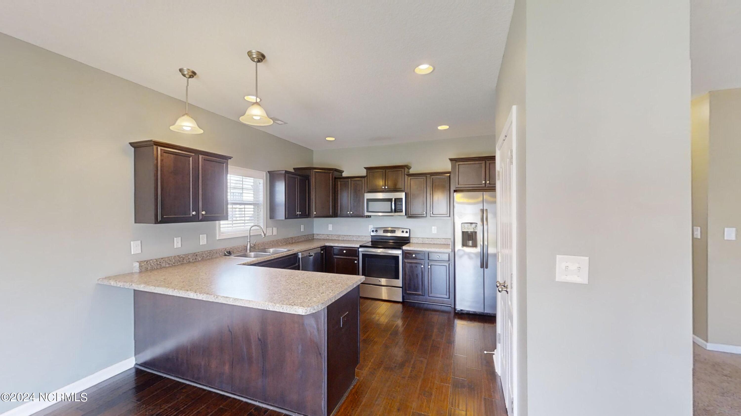 512 Romper Road Sneads Ferry, NC 28460 - Photo 22 of 32 512-Romper-Road-Kitchen