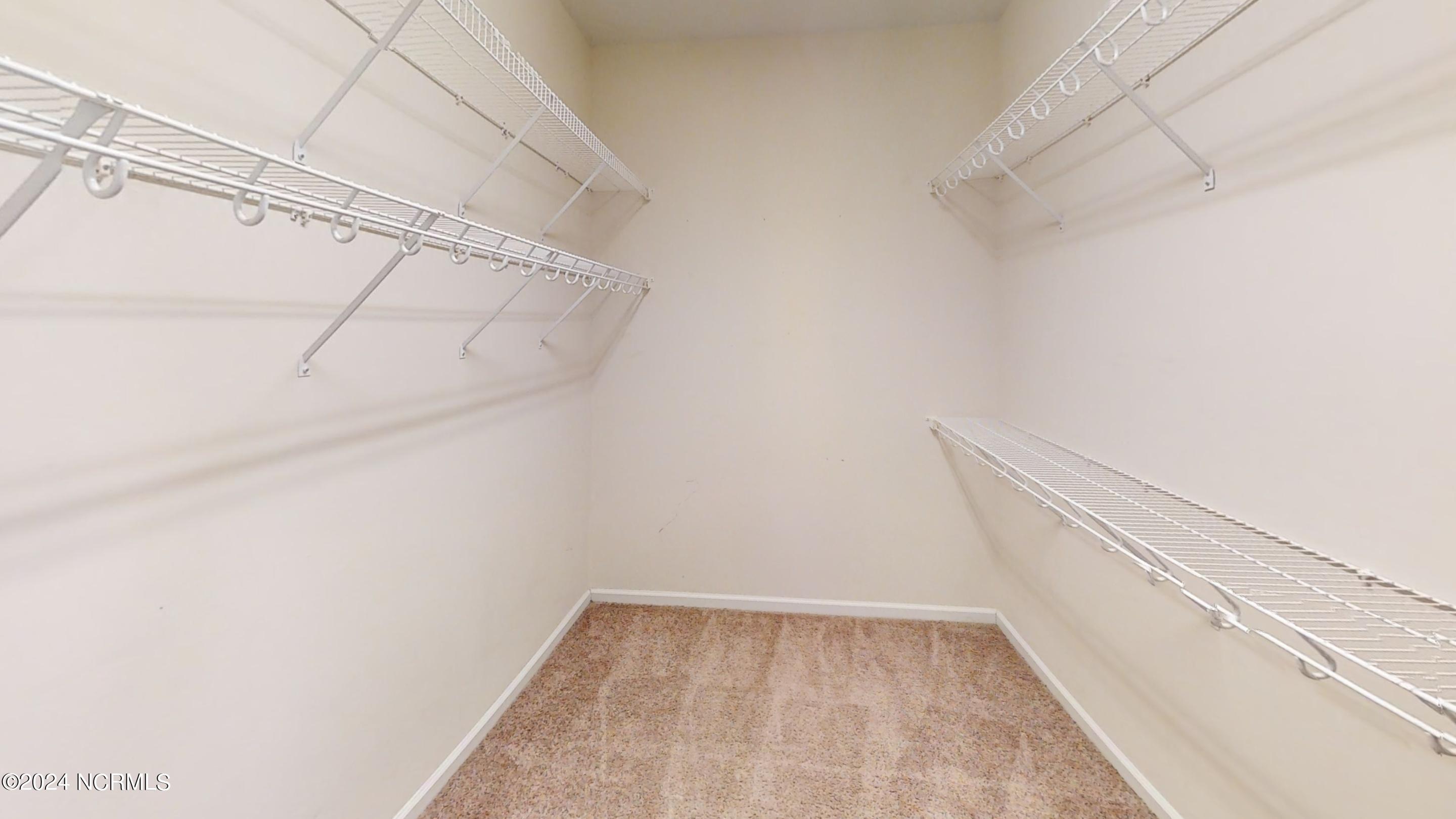 512 Romper Road Sneads Ferry, NC 28460 - Photo 26 of 32 512-Romper-Road-Primary-Walk-in-Closet