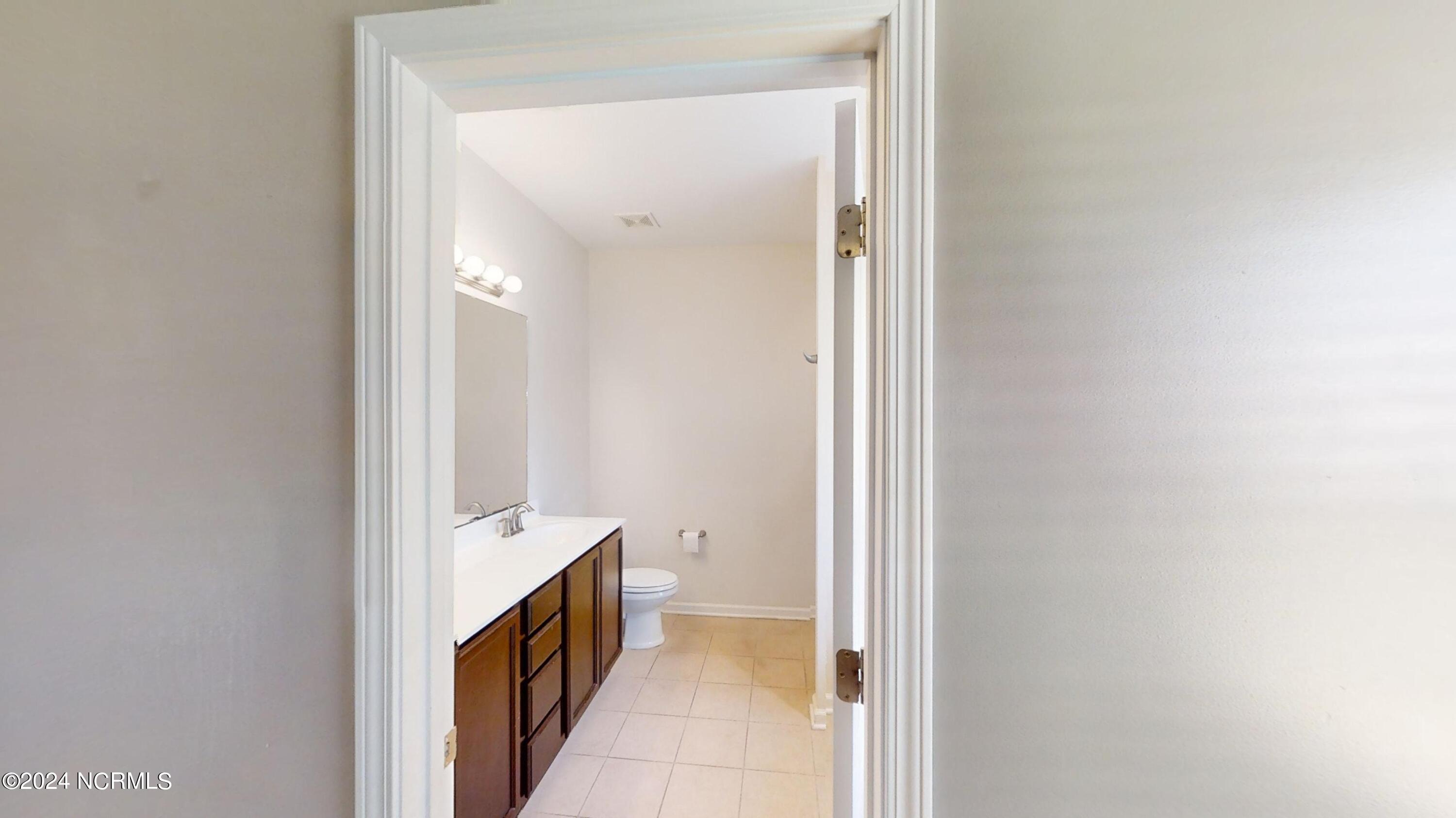 512 Romper Road Sneads Ferry, NC 28460 - Photo 27 of 32 512-Romper-Road-Primary-Bathroom