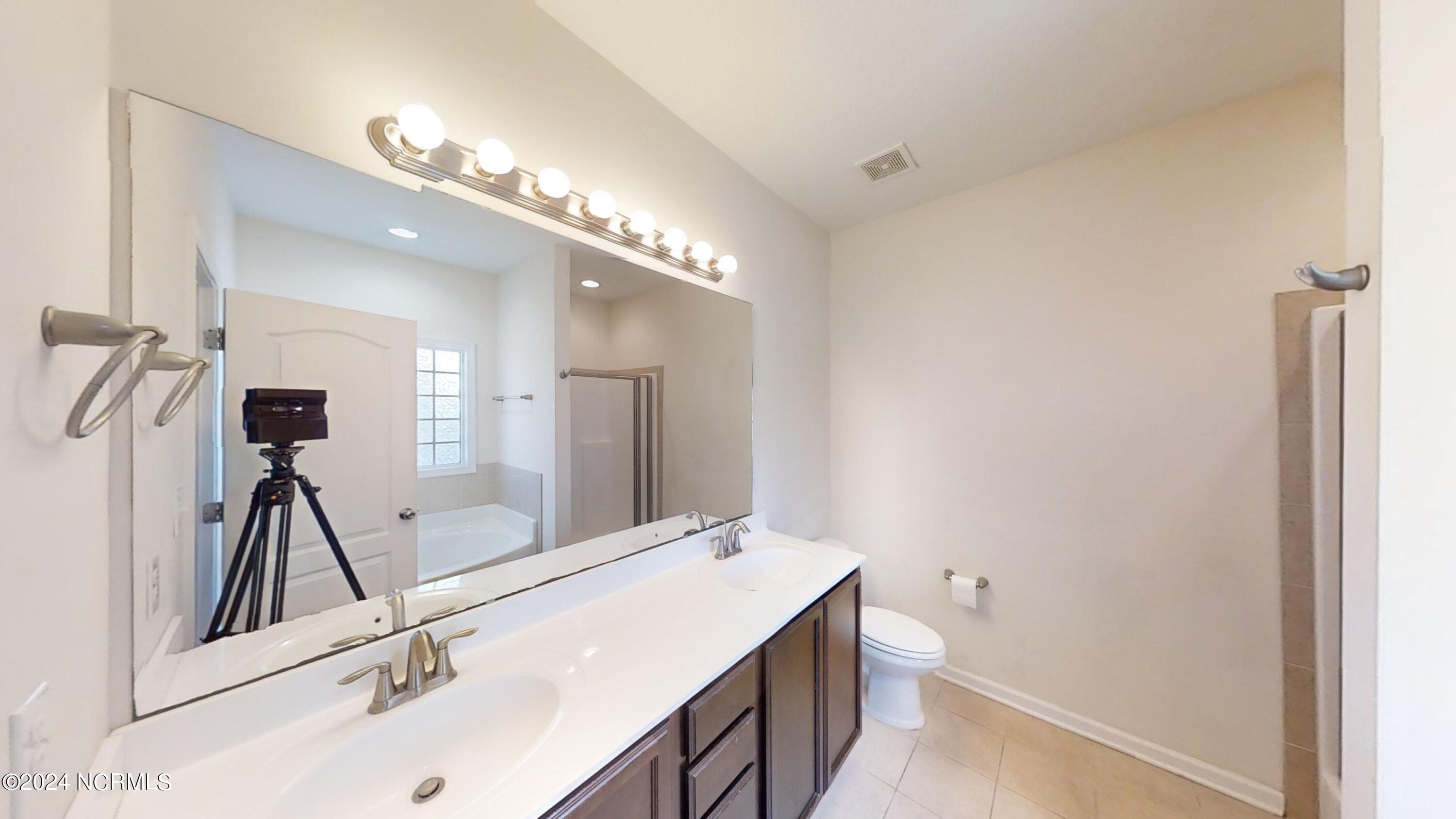 512 Romper Road Sneads Ferry, NC 28460 - Photo 28 of 32 512-Romper-Road-Primary-Bathroom-