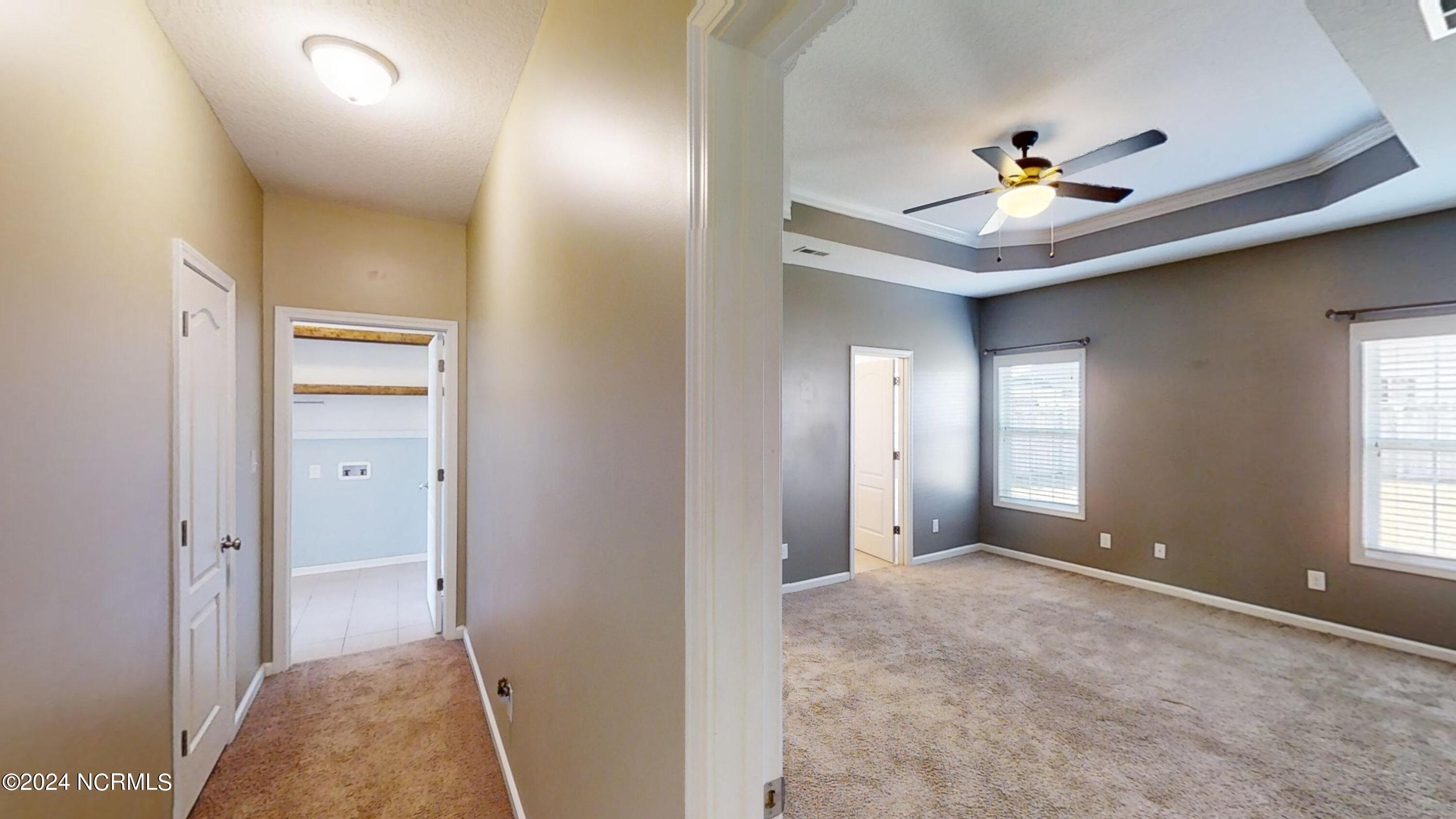512 Romper Road Sneads Ferry, NC 28460 - Photo 30 of 32 512-Romper-Road-HallwayPrimary-Bedroom