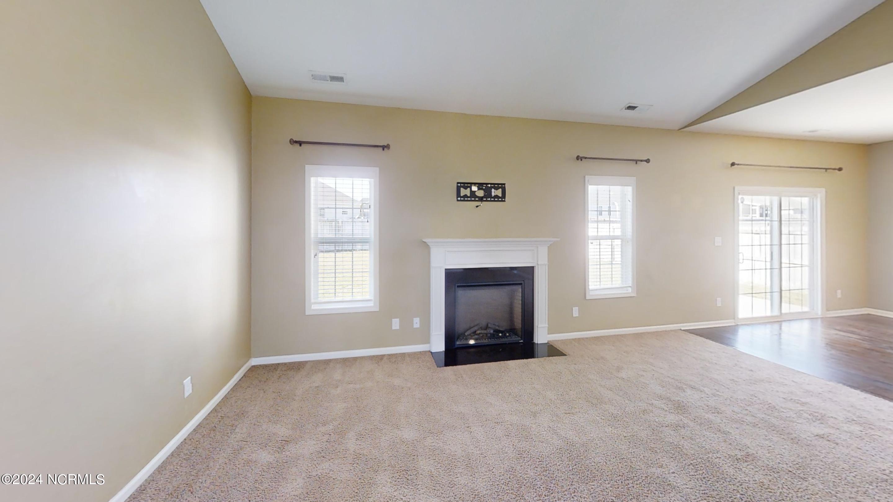 512 Romper Road Sneads Ferry, NC 28460 - Photo 9 of 32 512-Romper-Road-Living-Room 1