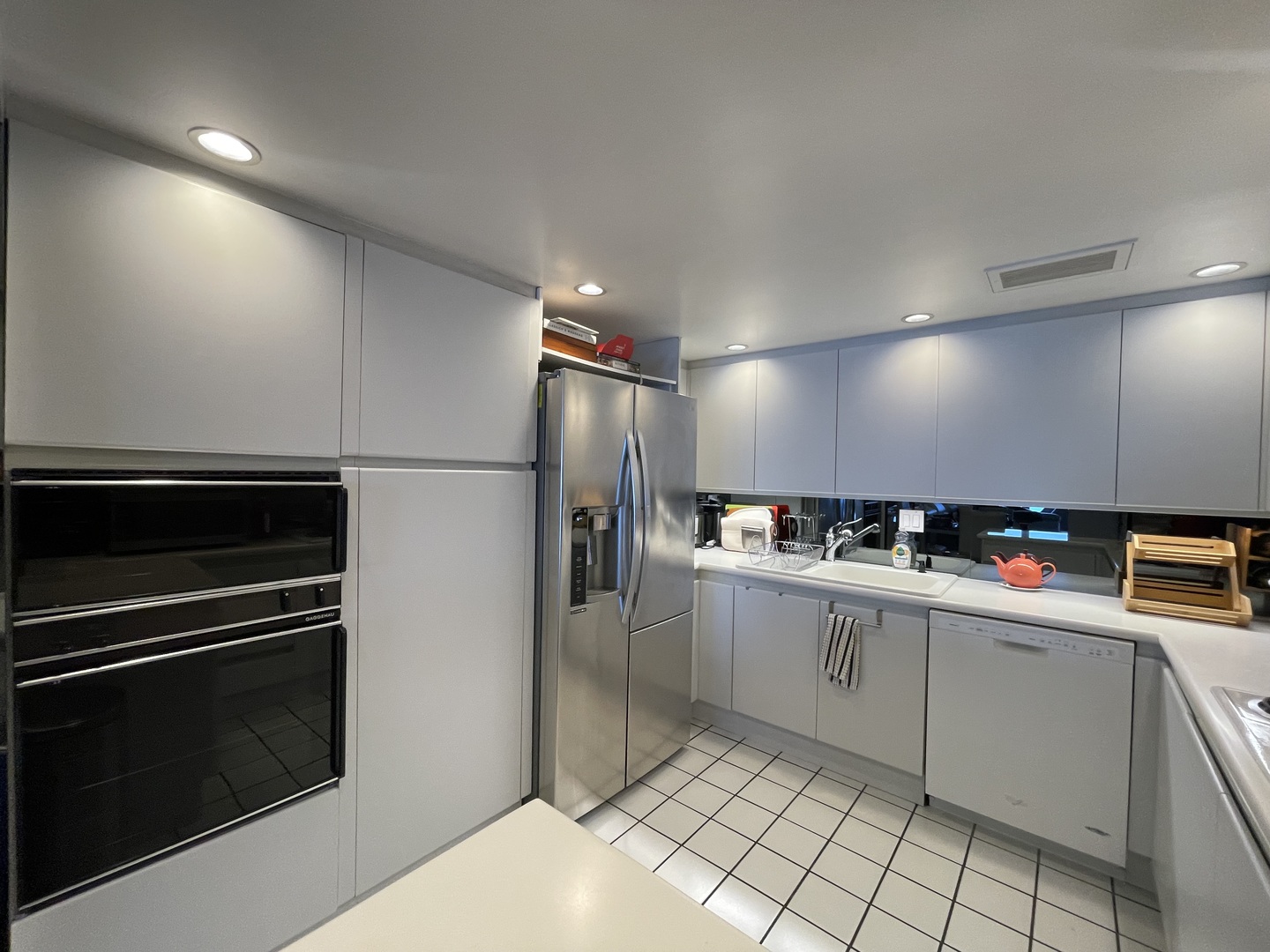 175 East Delaware Place, Unit 6706 Chicago, IL 60611 - Photo 11 of 30 a kitchen with stainless steel appliances a refrigerator and a stove top oven