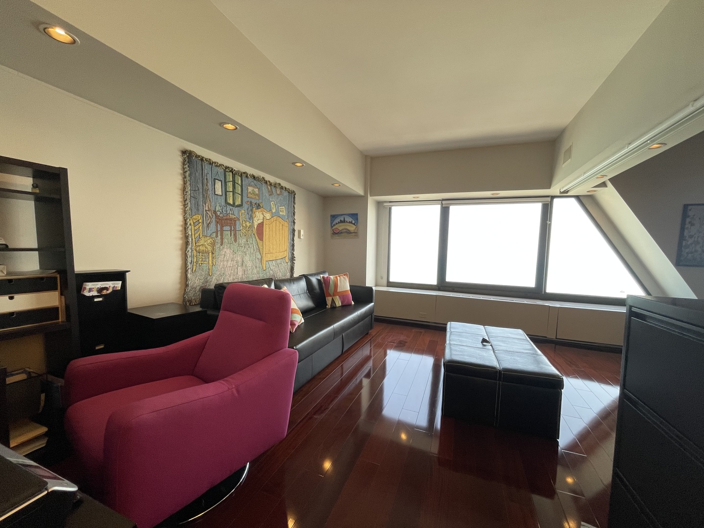175 East Delaware Place, Unit 6706 Chicago, IL 60611 - Photo 16 of 30 a living room with furniture and a floor to ceiling window