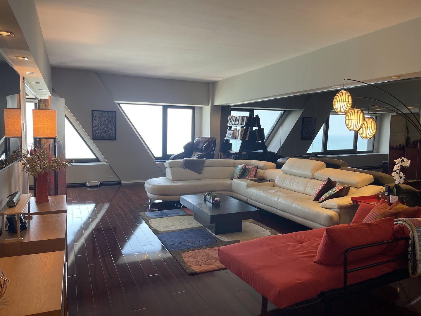 175 East Delaware Place, Unit 6706 Chicago, IL 60611 - Photo 5 of 30 a living room with furniture and a large window