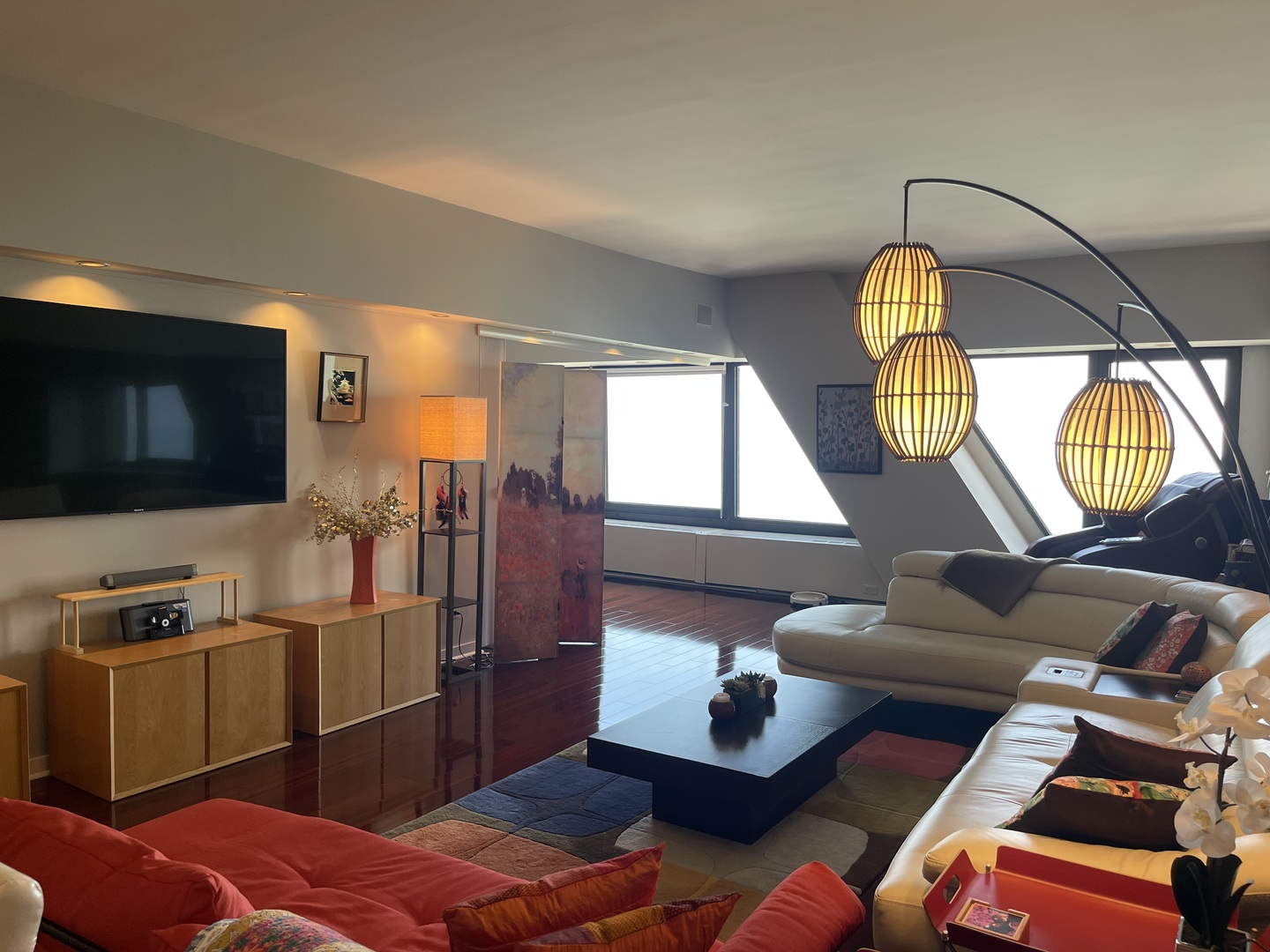 175 East Delaware Place, Unit 6706 Chicago, IL 60611 - Photo 6 of 30 a living room with furniture and a flat screen tv