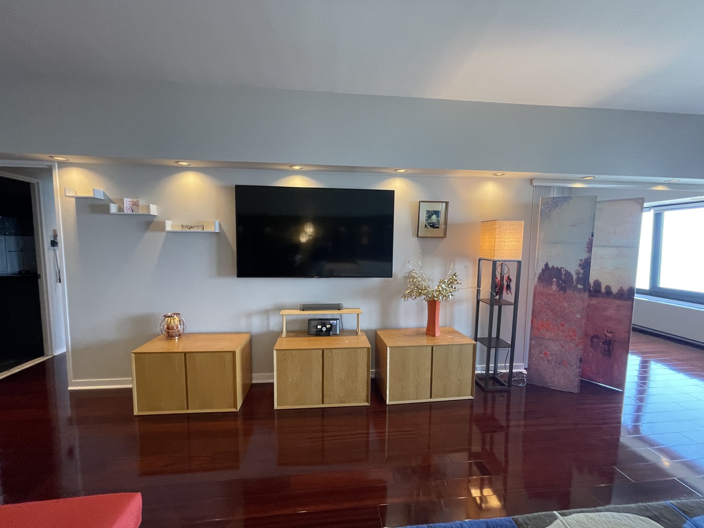 175 East Delaware Place, Unit 6706 Chicago, IL 60611 - Photo 8 of 30 a living room with furniture and a flat screen tv