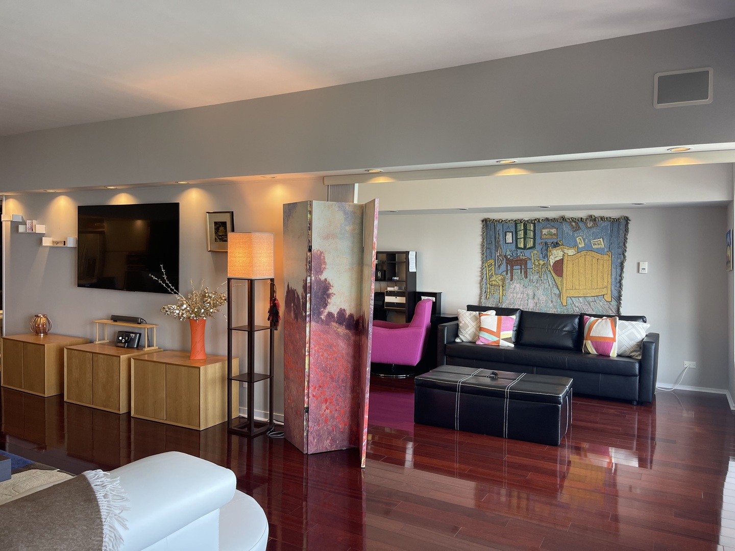 175 East Delaware Place, Unit 6706 Chicago, IL 60611 - Photo 9 of 30 a living room with furniture and a flat screen tv