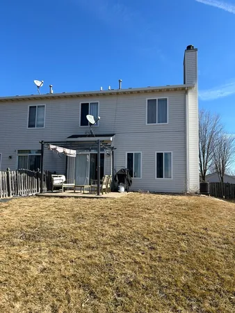 a view of a house with a patio