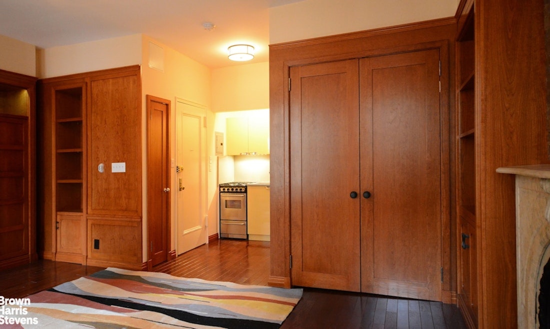 428 West 44th Street Manhattan, NY 10036 - Photo 14 of 17 a bathroom with a shower and a sink