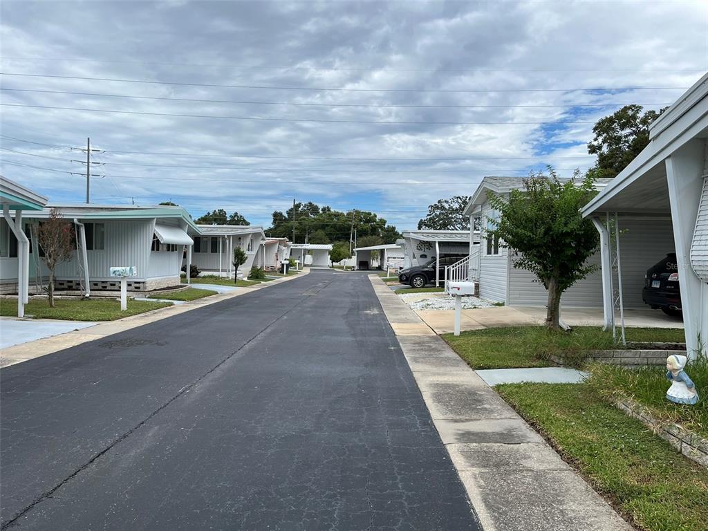 1040 Main Street, Unit 192 Dunedin, FL 34698 - Photo 15 of 15 a view of house with outdoor space and entertaining space