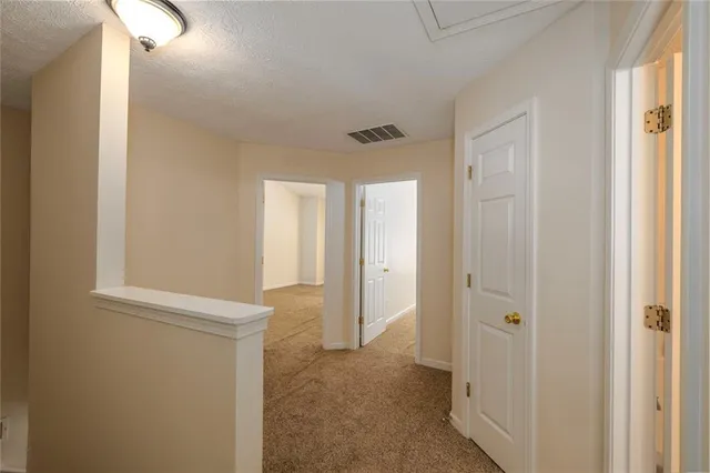 a view of entryway with bathroom