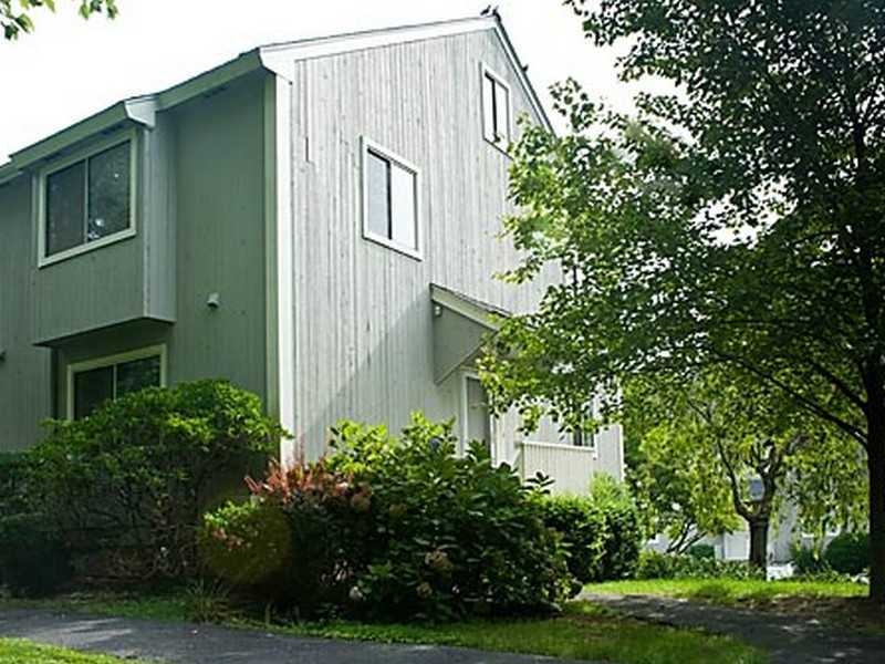 57 Stirrup Lane, Unit 57 Riverside, CT 06878 - Photo 2 of 17 a view of a house with a yard