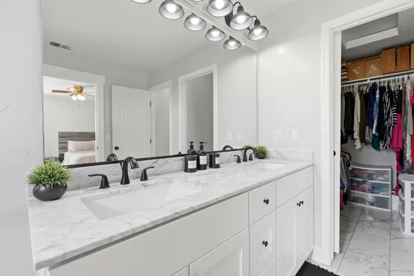 a view of backyard with seating area and green space