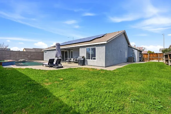 a view of a patio with couches table and chairs