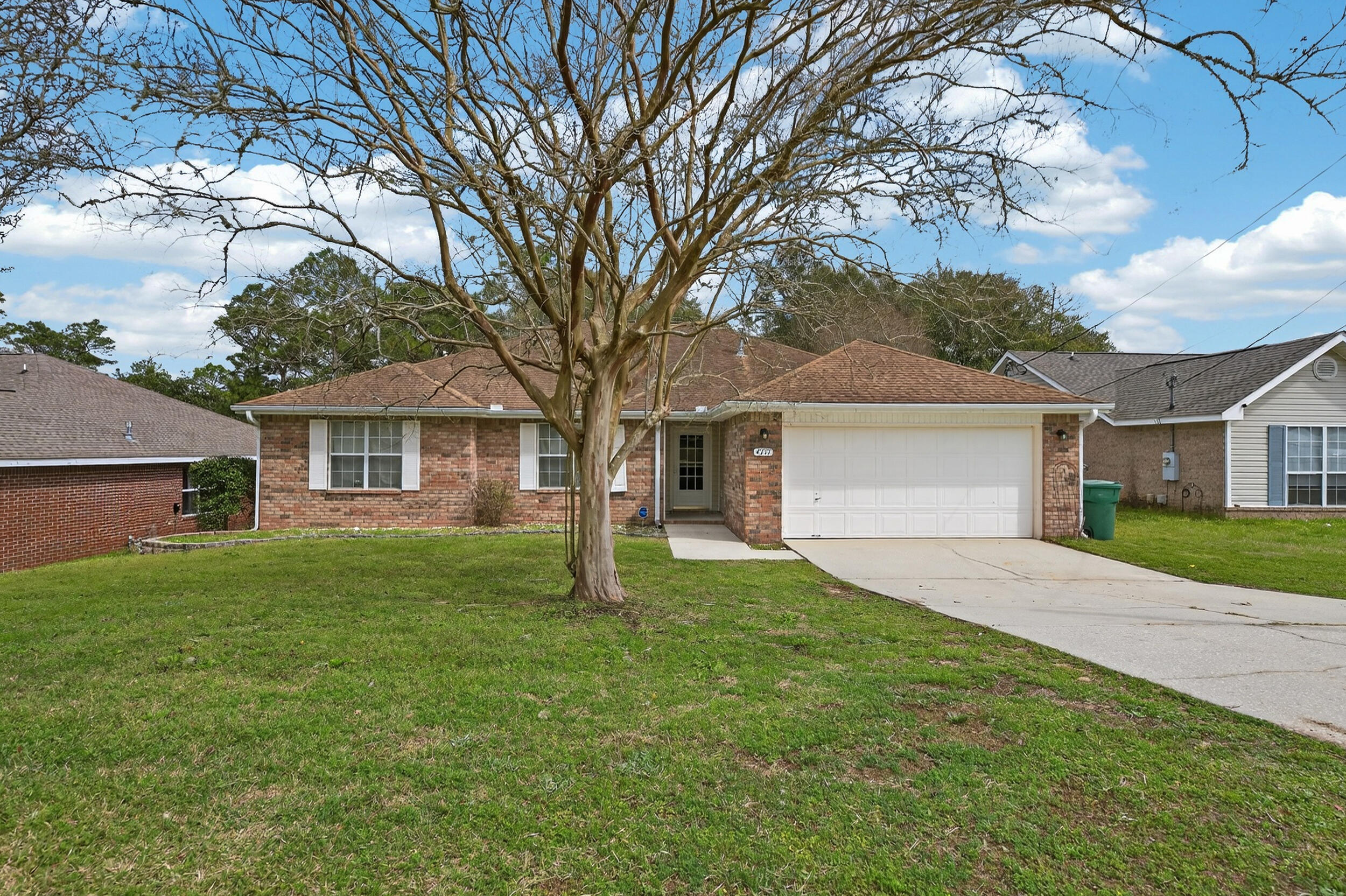 4717 Whitewater Lane Crestview, FL 32539 - Photo 1 of 55 a front view of house with yard and green space