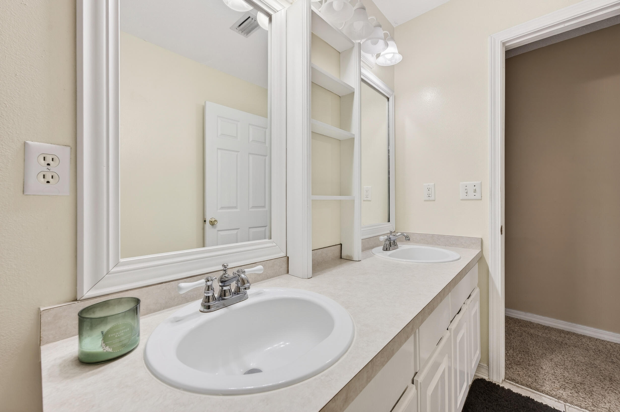 4717 Whitewater Lane Crestview, FL 32539 - Photo 28 of 55 a bathroom with a sink and a mirror