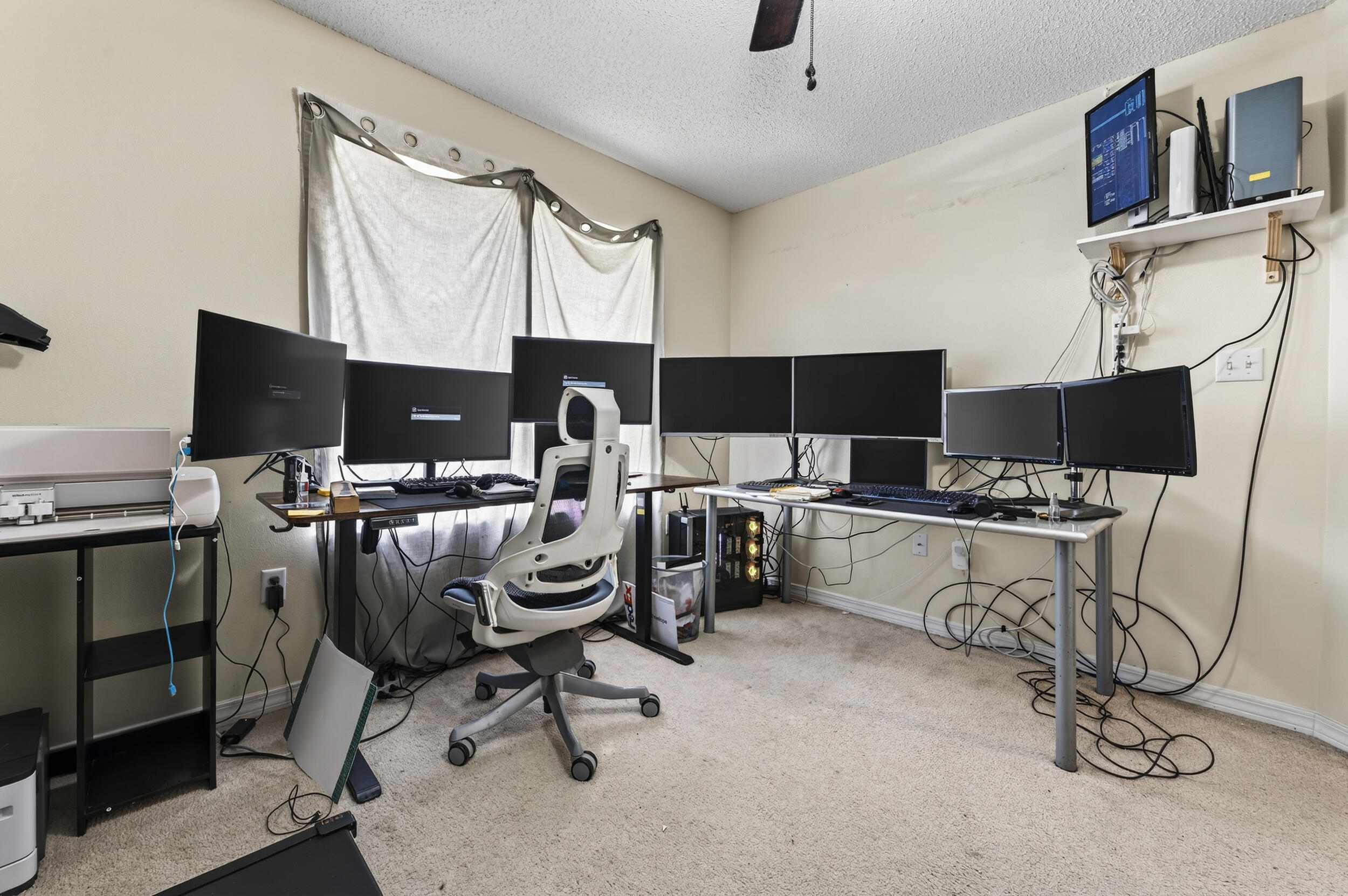 4717 Whitewater Lane Crestview, FL 32539 - Photo 39 of 55 a view of a workspace with furniture and a window