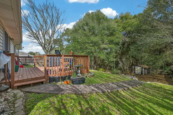 a backyard of a house with lots of green space