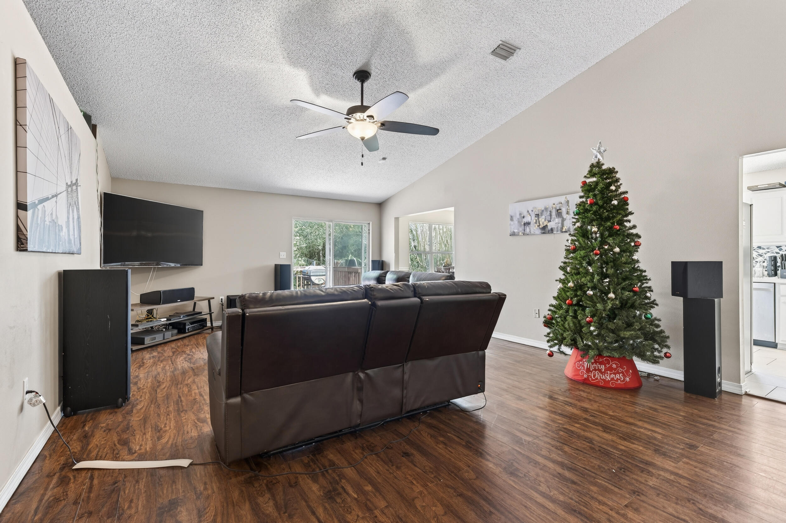 4717 Whitewater Lane Crestview, FL 32539 - Photo 7 of 55 a living room with furniture and a flat screen tv