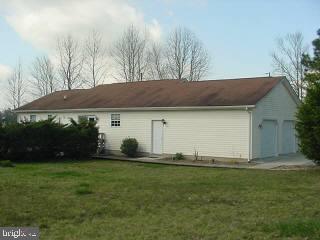 8747 New Hope Road Willards, MD 21874 - Photo 11 of 11 a front view of house with yard and trees
