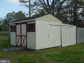 8747 New Hope Road Willards, MD 21874 - Photo 10 of 11 a view of backyard with cabin
