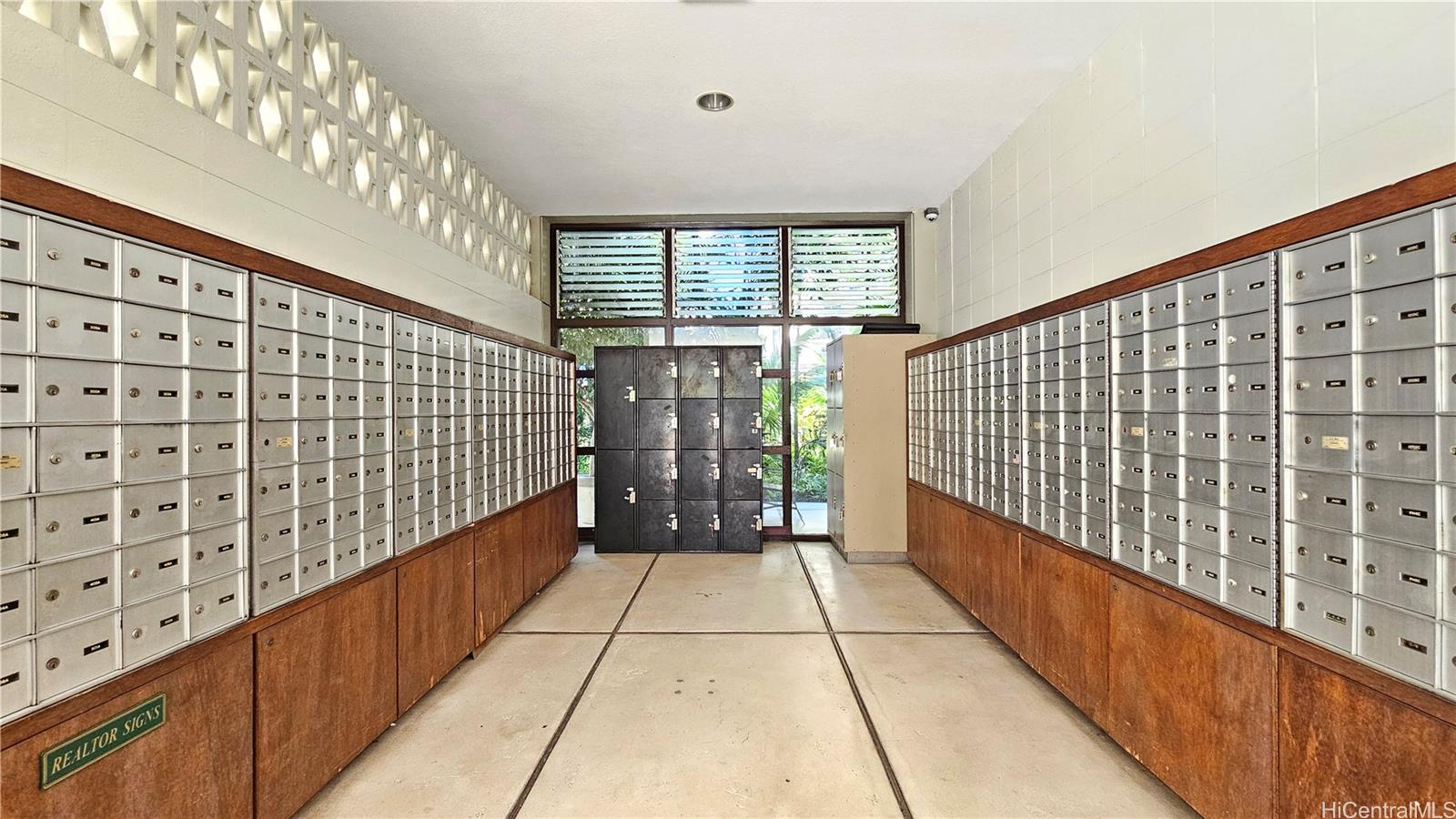 425 Ena Road, Unit B501 Honolulu, HI 96815 - Photo 13 of 16 a view of locker room with wooden floor