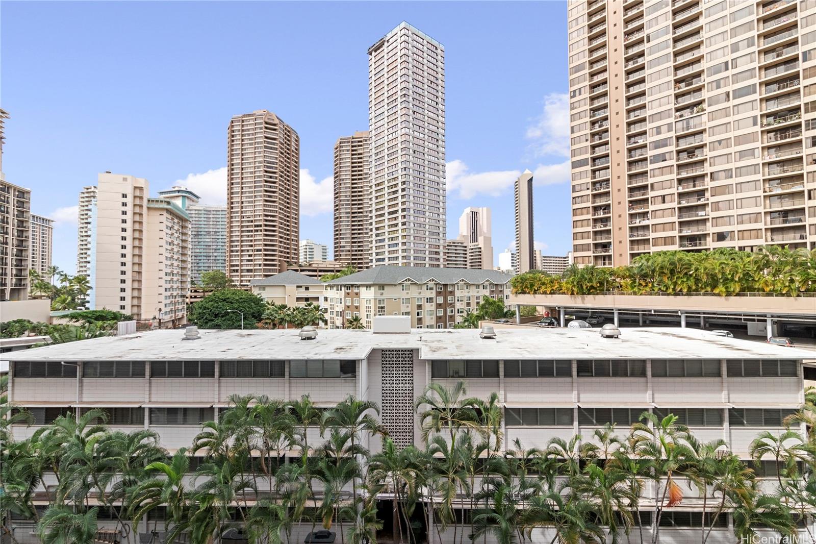 425 Ena Road, Unit B501 Honolulu, HI 96815 - Photo 9 of 16 a view of a city with tall buildings
