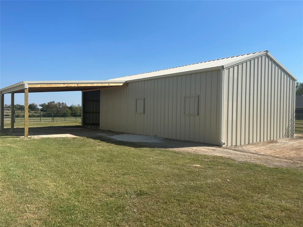 551 Massey Road Gunter, TX 75058 - Photo 39 of 40 View of pole building featuring a carport